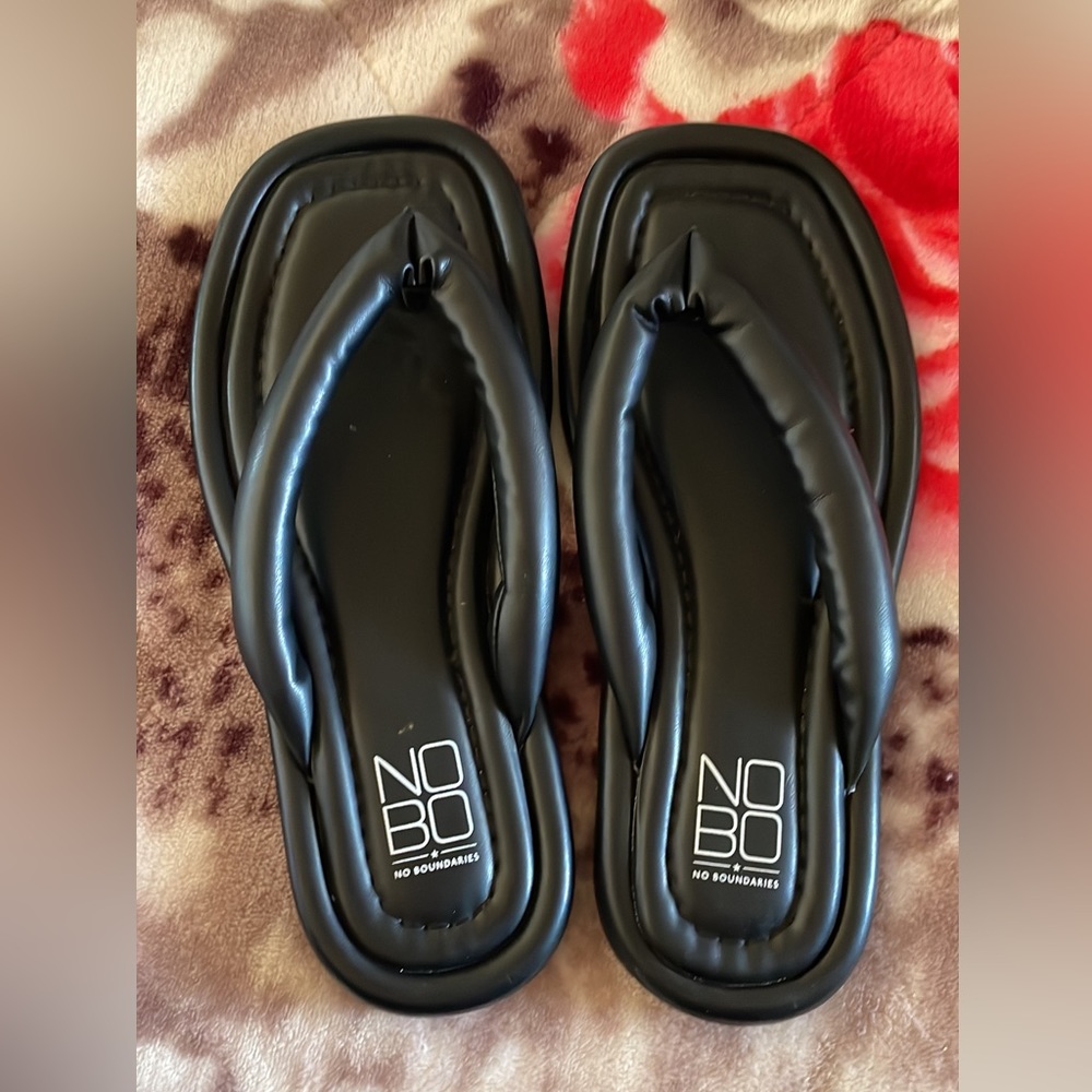 Black flip flops